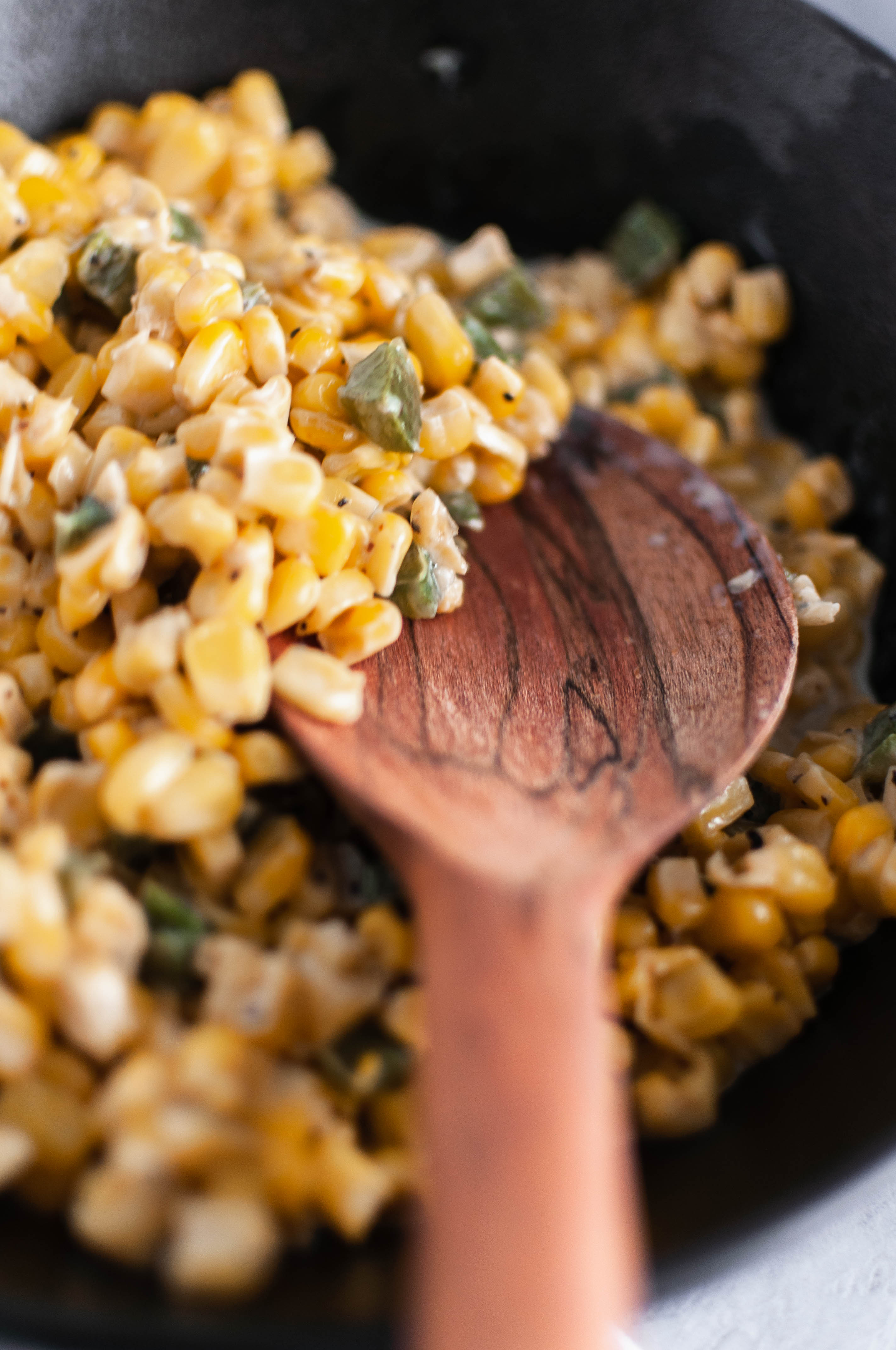 This Jalapeno Cream Corn is slightly spicy, a little sweet and perfectly creamy. It makes a great weeknight side dish or simple holiday option. Made on the stove top with frozen sweet corn, fresh jalapenos, butter and half and half. Ready to serve in minutes.