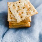 Seasoned Saltine Crackers are wonderful as a snack or a dipper for all the soups this winter. Tossed in oil, spices and herbs then baked to crispy perfection.