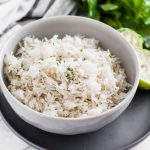 Instant Pot Cilantro Lime Rice couldn't get easier with 3 ingredients and a 4 minute cook time. Super flavorful and perfect with any Mexican meal.