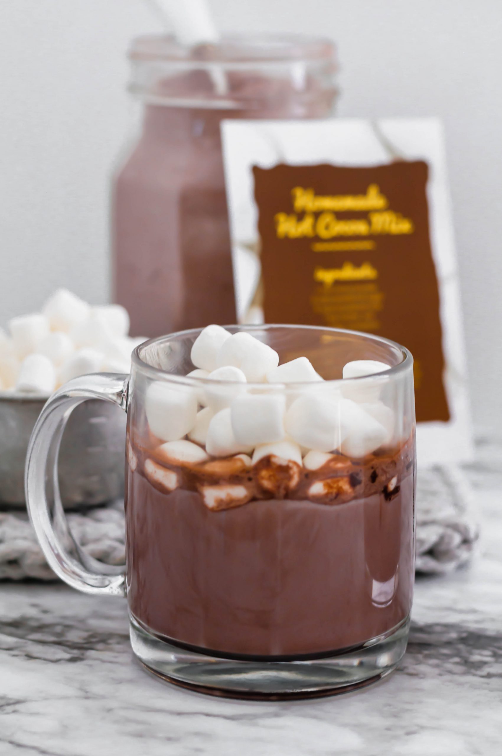 Skip the store-bought mix and make your own Hot Cocoa Mix. Only 5 ingredients and a minute to mix. The creamiest, richest hot cocoa around with a free printable for gifting.