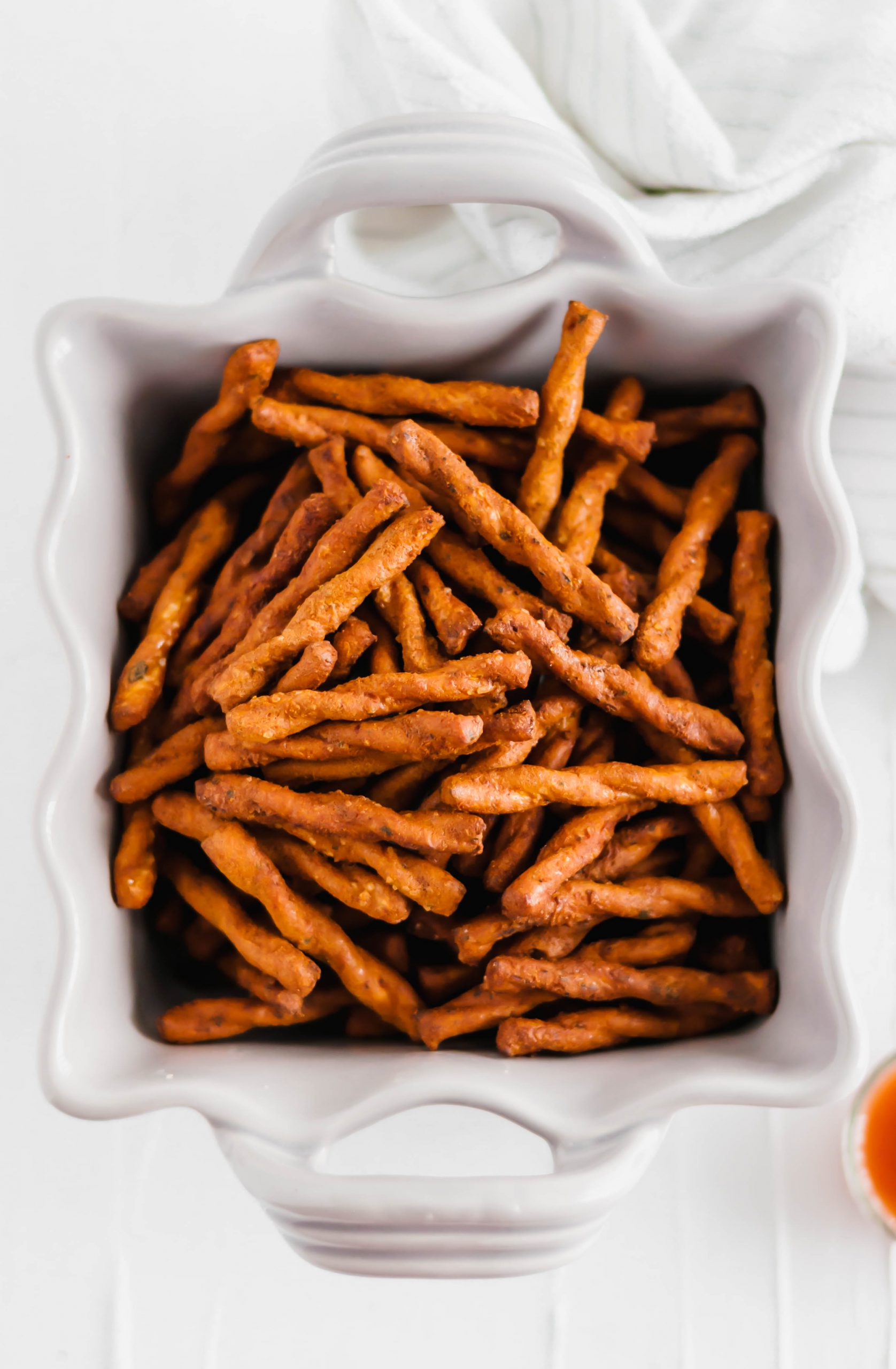 Snacks make everything better. Especially when they are spicy Buffalo Pretzels. They are easy to make and will have you addicted from the start.