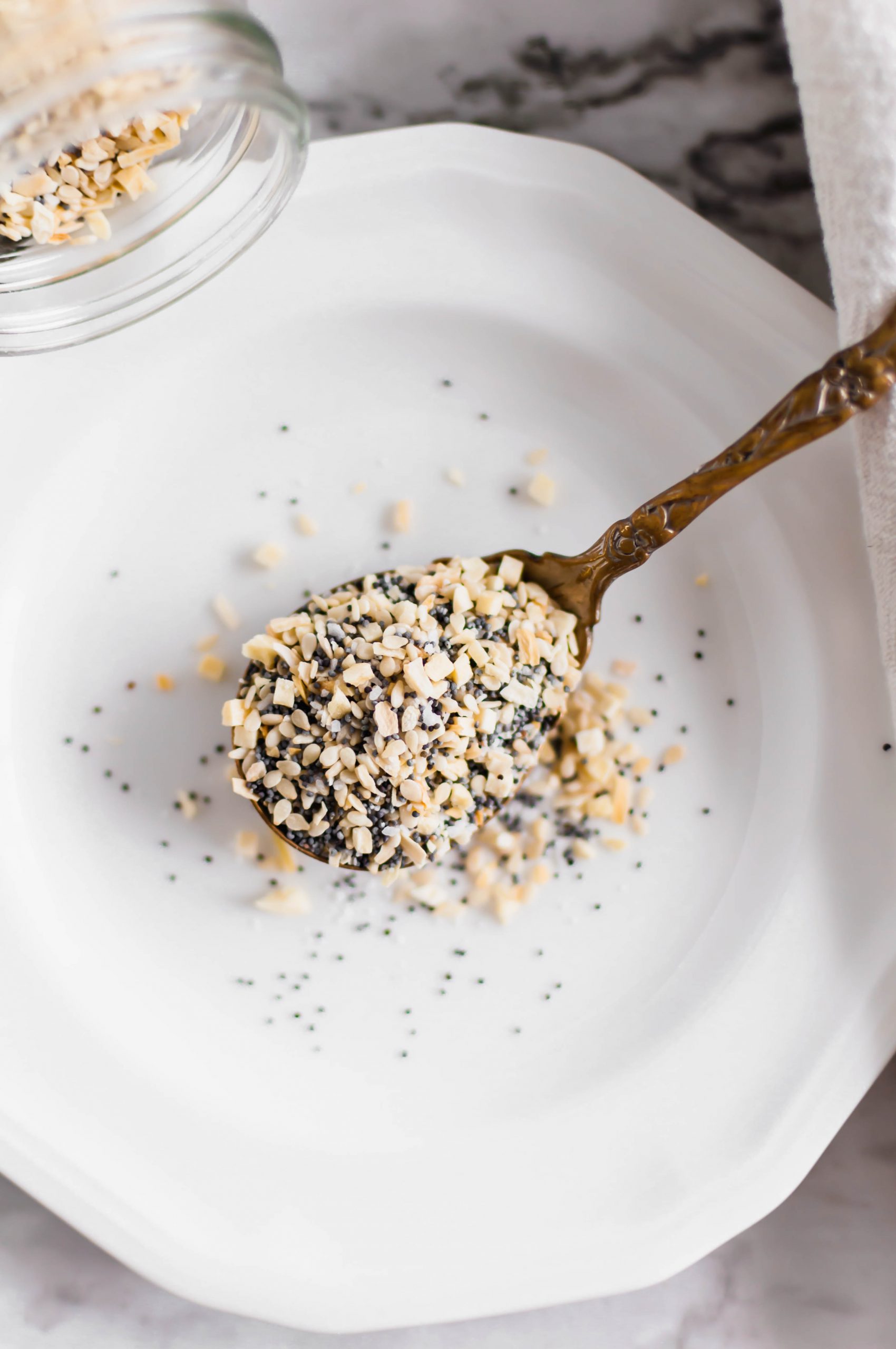 Skip the store-bought and make your own everything bagel seasoning at home. It's simple to make with just a handful of spices. Delicious on chicken, beef, pork, veggies, eggs and more.