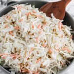 This Creamy Coleslaw is perfect for weeknights, holidays, potlucks and so much more. Made with coleslaw mix and pantry and refrigerator staples.