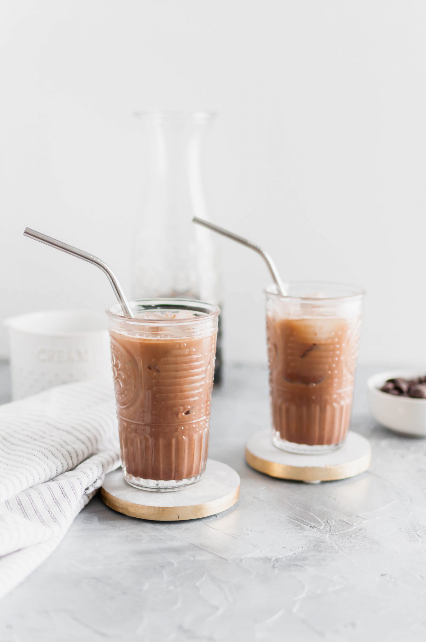 Missing your favorite coffee shop? Try making a classic at home with this Iced Mocha Recipe. Only three ingredients required!