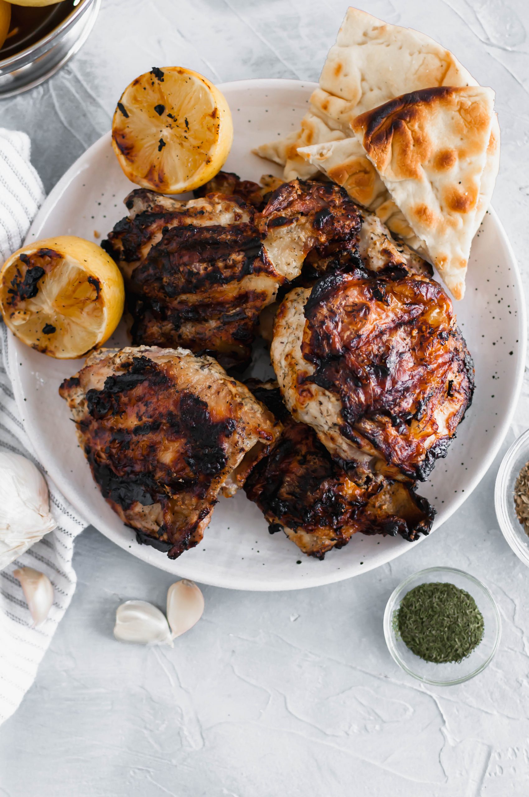 Whip up a batch of Greek Chicken Marinade in minutes for the most flavorful chicken on the grill. Packed with lemon, dill, oregano and garlic.