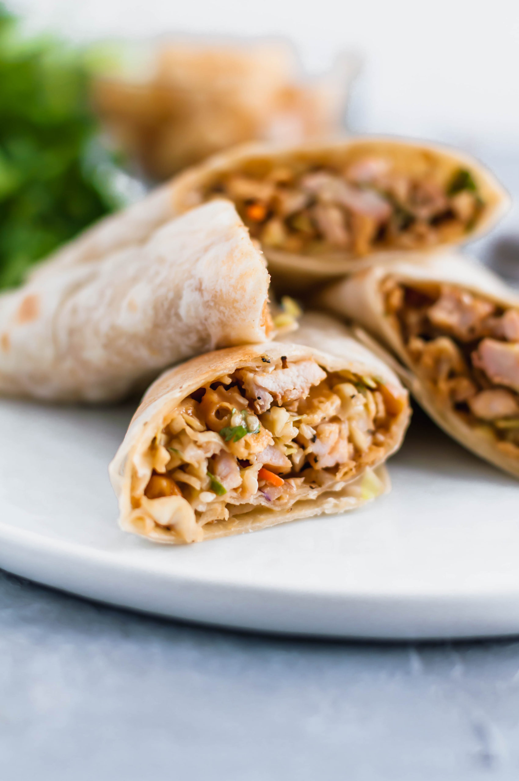Thai Chicken Wraps will become your new summer go to meal. They are simple to make, packed with flavor and perfectly light.