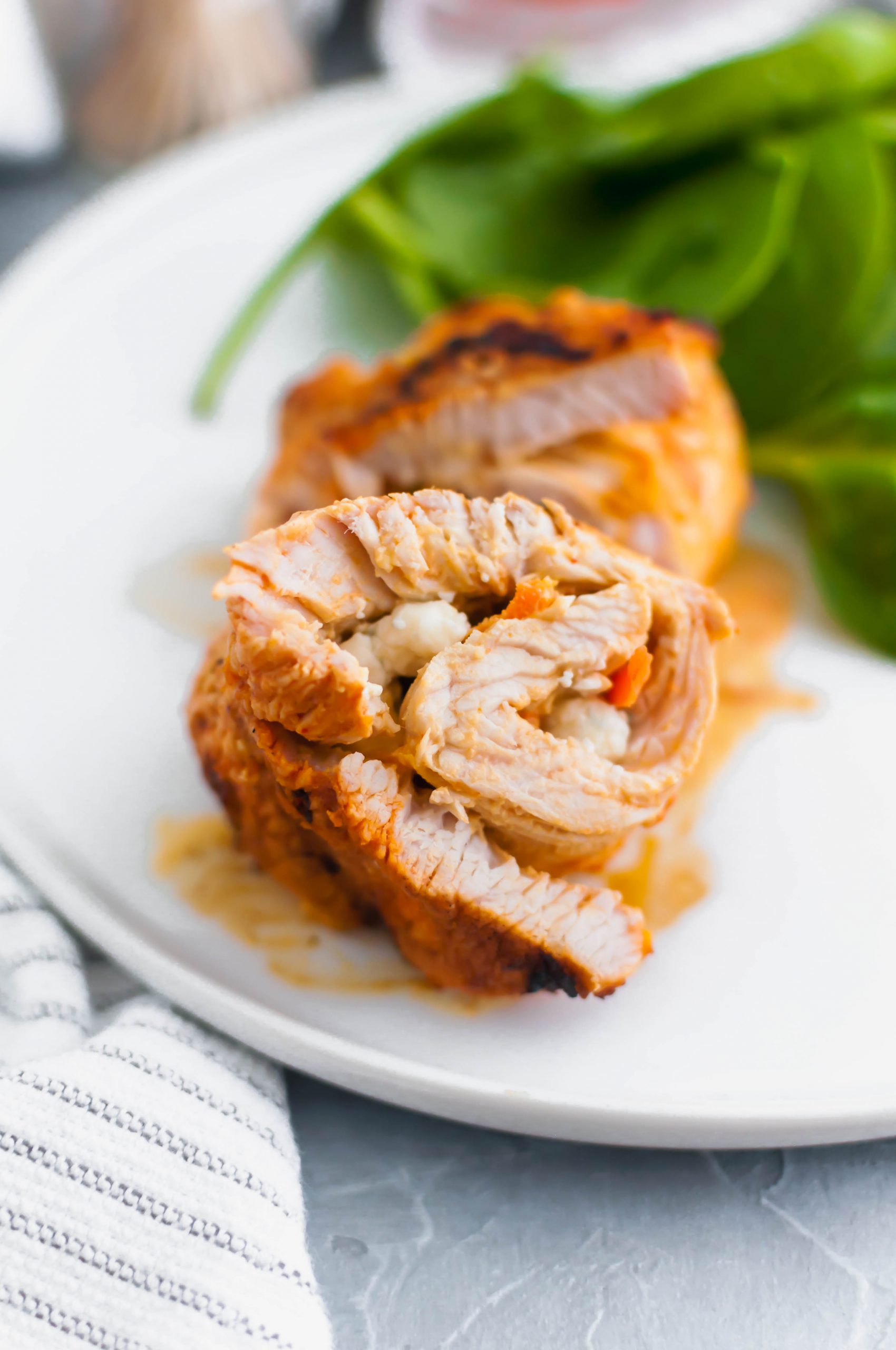 This Buffalo Stuffed Turkey is the ultimate summer dinner. Thin turkey cutlets stuffed with a buffalo sauce spiked cream cheese and blue cheese, rolled and grilled to juicy perfection.