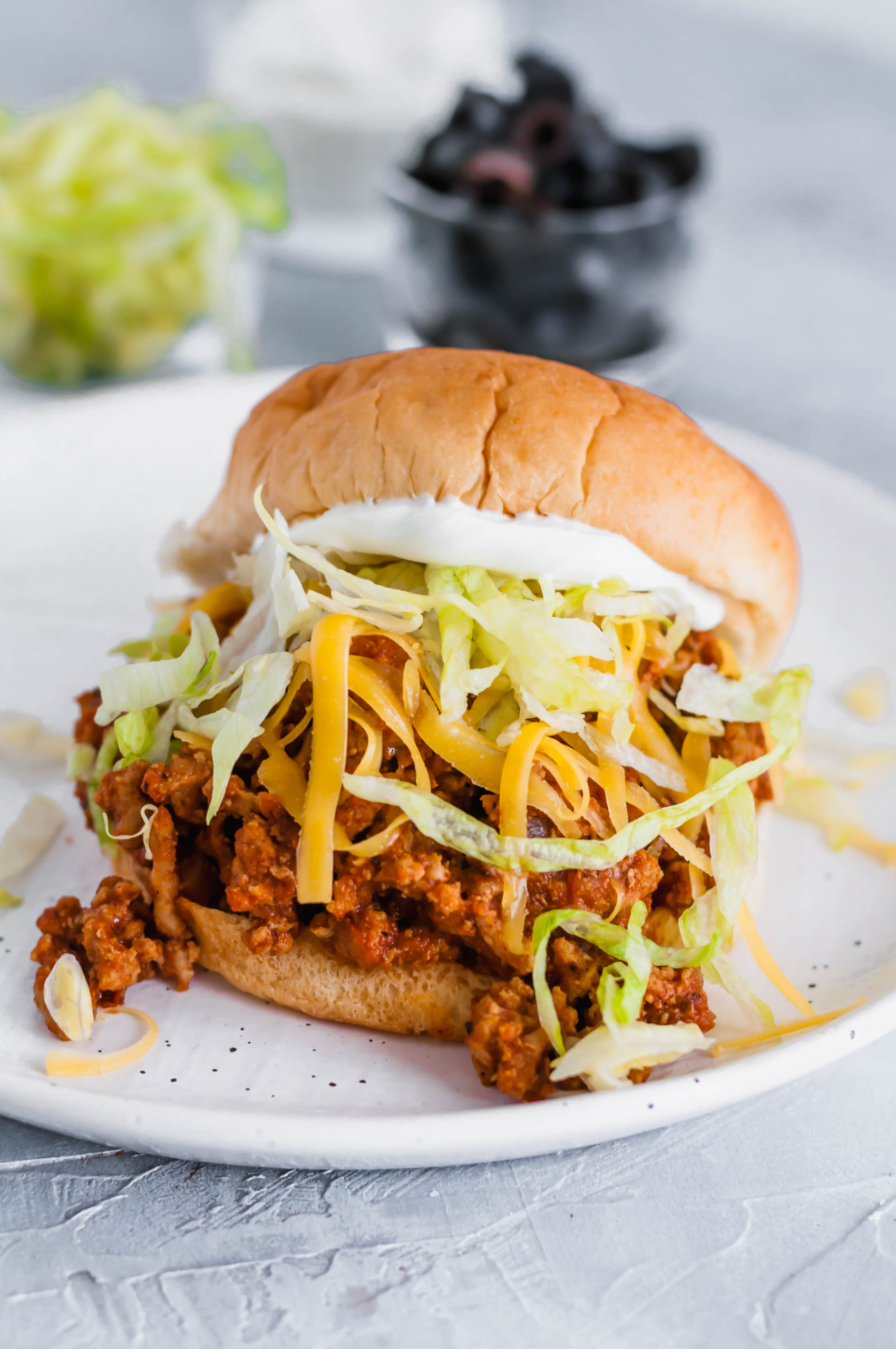 Get ready for back to school with these Taco Turkey Sloppy Joes. They are quick (less than 30 minutes), easy and a big family pleaser. Top with all your favorite taco toppings.