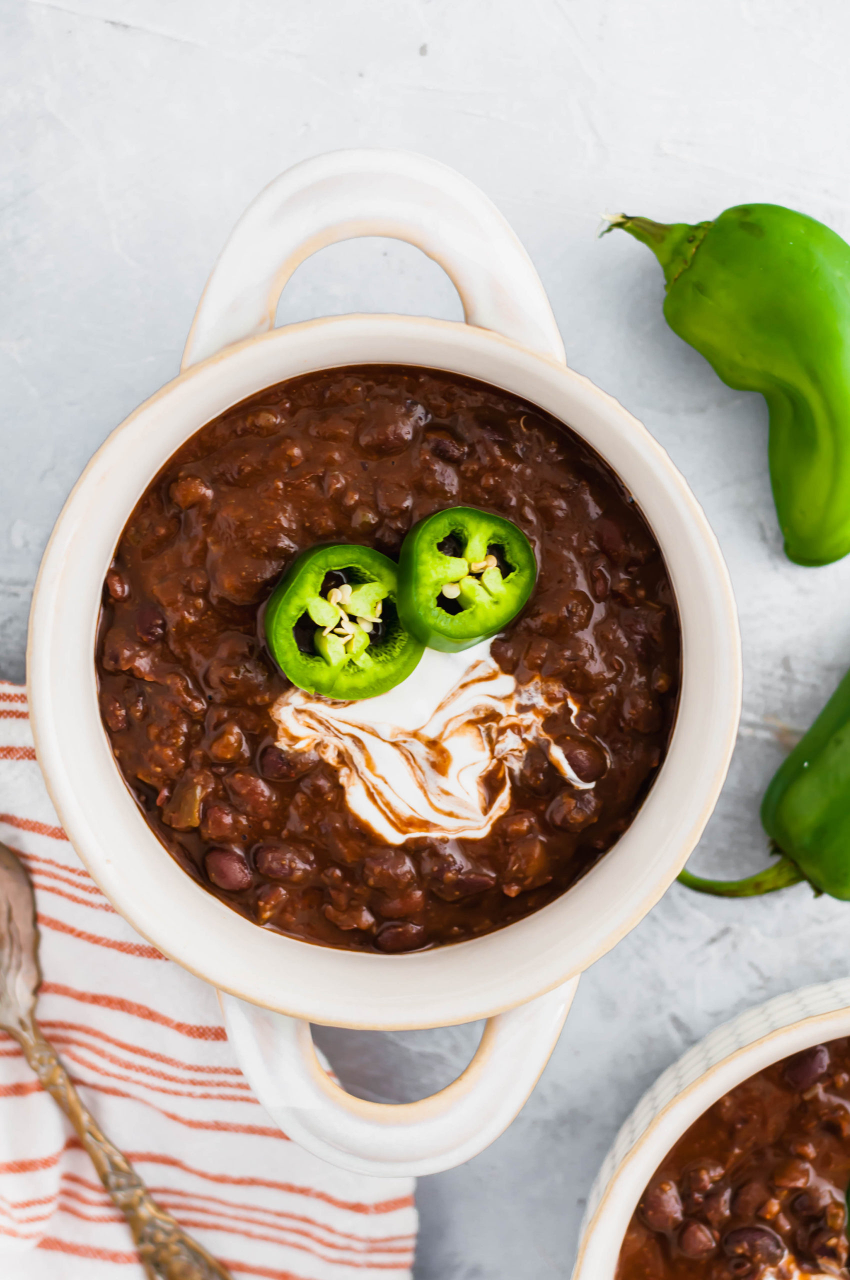 Don't let the falling temperatures bring you down. This Spicy Black Bean Soup is just what you this fall and winter to keep you warm and cozy.