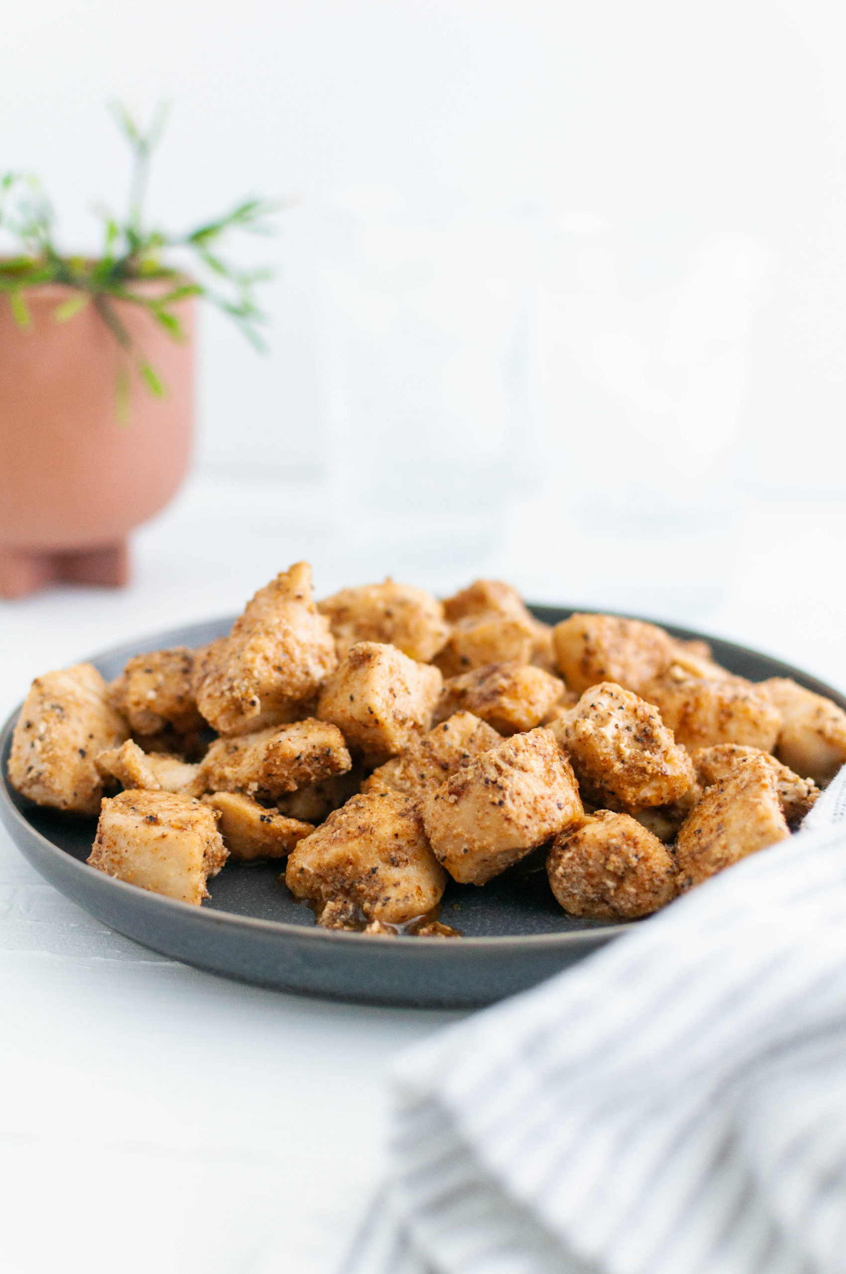 These Easy Baked Chicken Bites are weeknight perfection. Eat them on their own with a side dish or add them to salads, pasta and more.