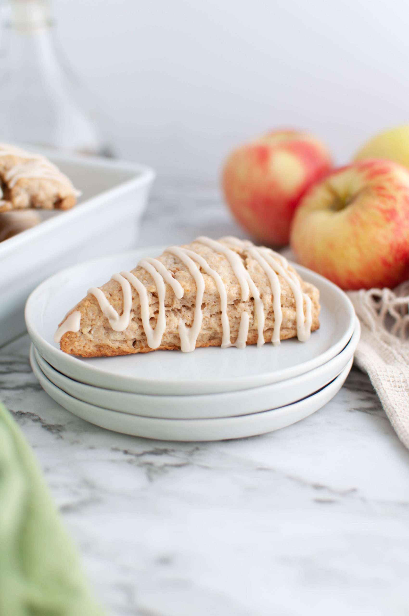 These Apple Cinnamon Scones with Maple Glaze are the perfect fall treat. Easy to make and perfectly tender.