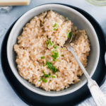 Date night in just got a little fancier with this Roasted Garlic Risotto. Simple risotto jazzed up with sweet, nutty roasted garlic.