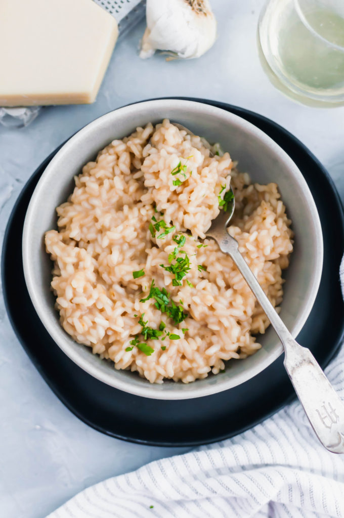 Date night in just got a little fancier with this Roasted Garlic Risotto. Simple risotto jazzed up with sweet, nutty roasted garlic.