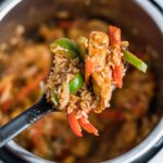 Need an easy, flavorful dinner with little effort? This Instant Pot Fajita Chicken and Rice is a meal in one pot that everyone will love.