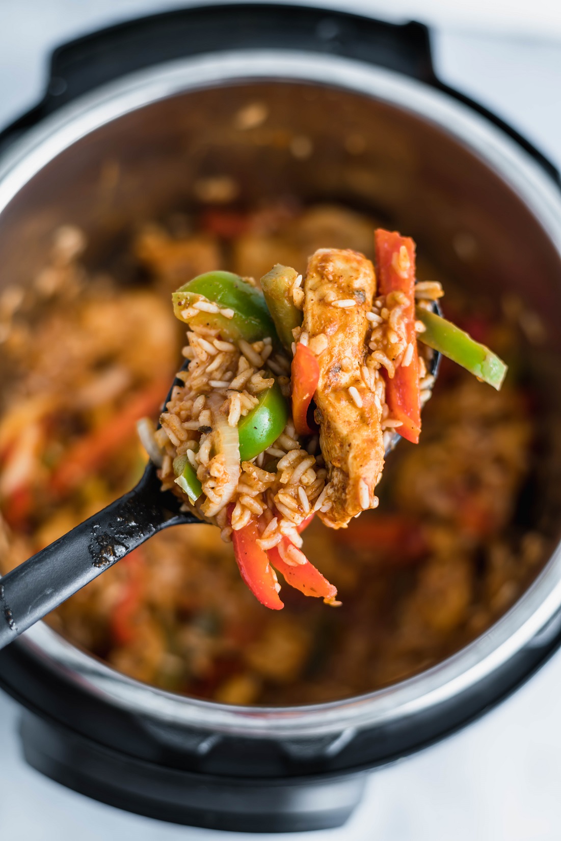 Need an easy, flavorful dinner with little effort? This Instant Pot Fajita Chicken and Rice is a meal in one pot that everyone will love.