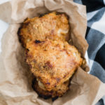 Love fried chicken but hate frying food at home?! This Oven Fried Chicken is perfeclty crispy, juicy and super flavorful. Perfectly spiced and super tender from a buttermilk marinade.