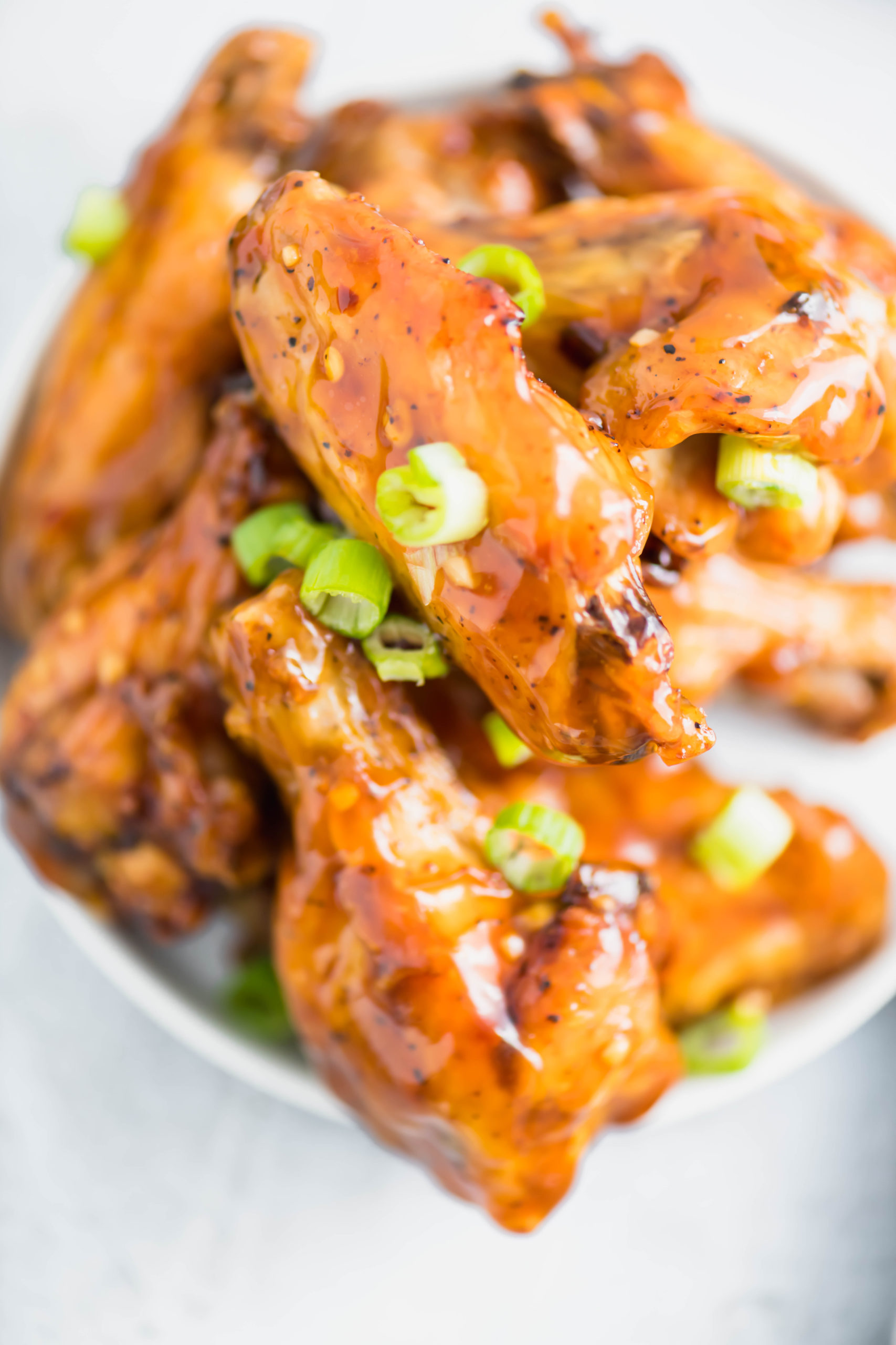 Need a fun and flavorful chicken wing recipe for the Super Bowl? These Orange Chicken Wings are packed with bright, spicy flavor.
