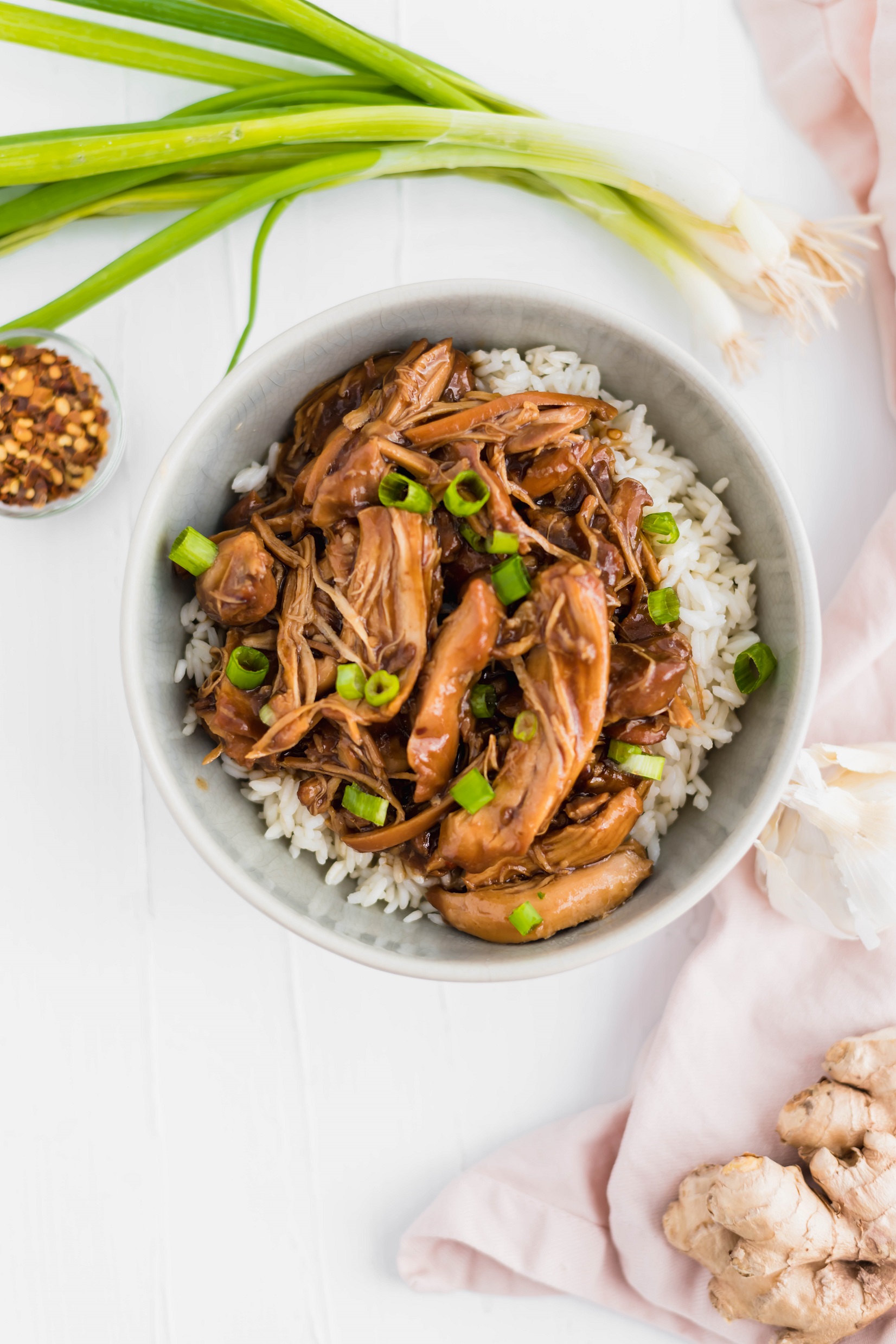 Slow Cooker Bourbon Chicken is just what your busy weeknights need. Packed full of sweet, sticky, rich flavor.