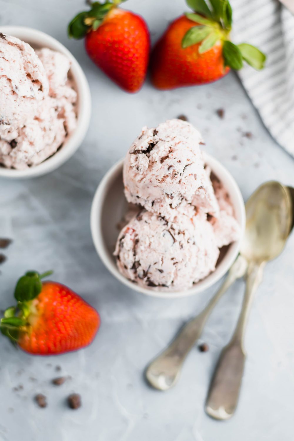 Strawberry Chocolate Chip Ice Cream is sweet, creamy perfection. A delicious, pretty pink dessert for Valentine's day. A tasty treat for all summer long too.
