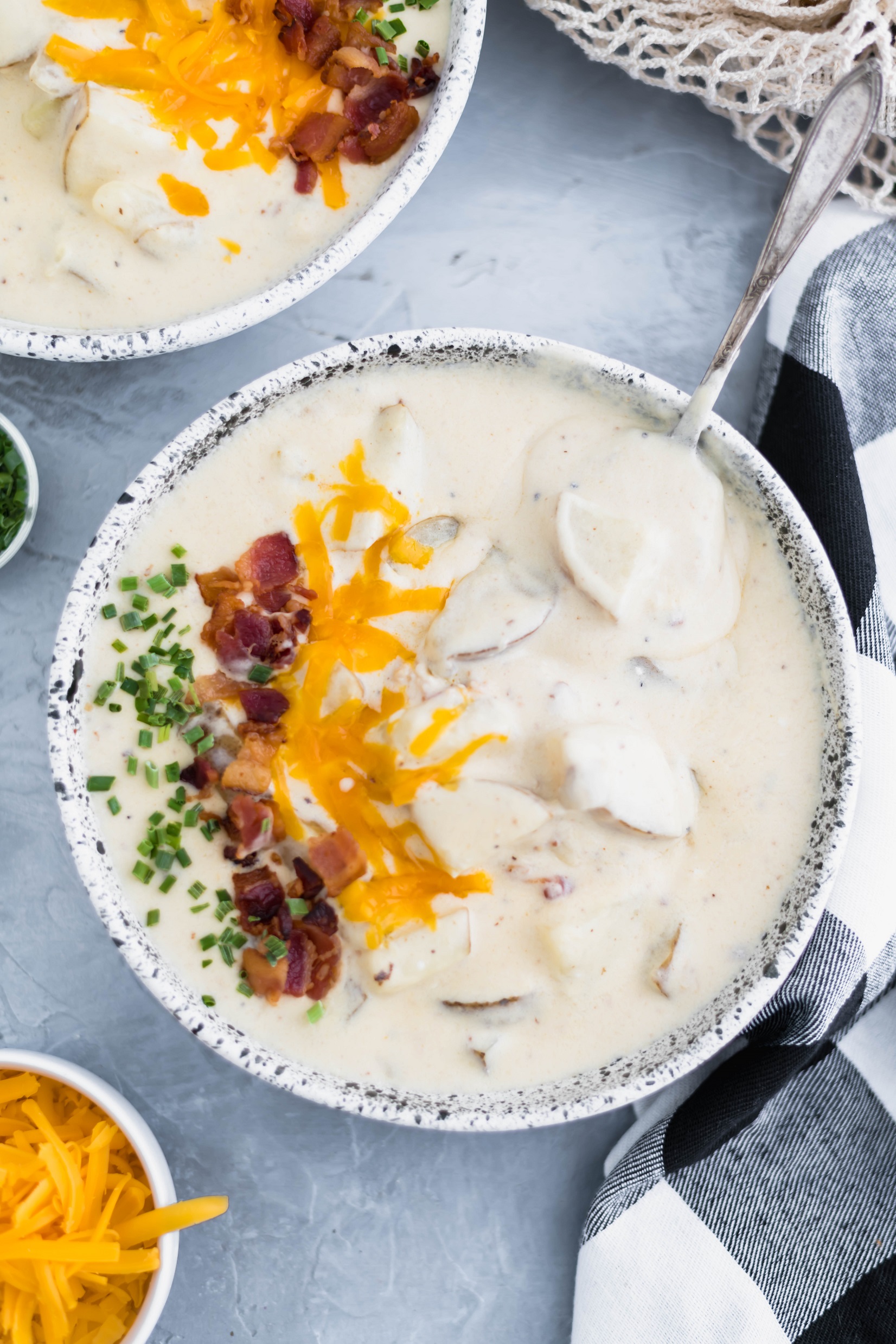 This fillling and hearty Loaded Baked Potato Soup is packed with all your favorite potato toppings. Incredibly creamy and done in about 30 minutes.