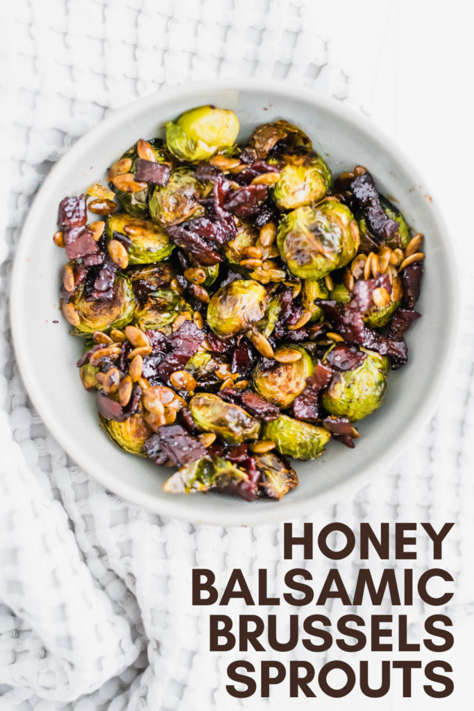 Honey Balsamic Brussels Sprouts are roasted perfectly in the oven then drizzled with the tastiest sweet and savory sauce. Topped with crispy bacon and pumpkin seeds for the perfect crunch.