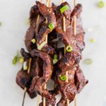 Thinly sliced flank steak in a delicious Asian marinade and threaded onto skewers make up these delicious Grilled Steak Kabobs. Sure to be a summertime favorite.
