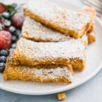 These Crunchy French Toast Sticks are sure to become a family favorite. Thick cut bread cut into sticks and coated in your favorite cereal crumbs. The perfect freezer friendly breakfast.