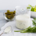 Dill Pickle Ranch is the dressing you didn't know you needed. Packed full of chopped dill pickles and pickle juice, this dressing will be delicious on all your summer salads.