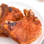 Warm weather means it's time to break out the smoker. These Smoked Pork Chops are super simple to make and done in less than 2 hours.