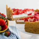 I combined two favorite summer desserts, cheesecake and strawberry pie, to make the most delicious treat, Strawberry Cream Cheese Pie. A fluffy, no-bake cheesecake filling topped with classic strawberry pie filling will have you addicted in no time.