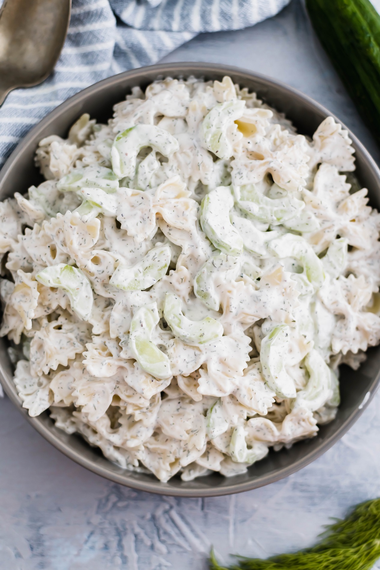 Two delicious summer salads combine to create this creamy Cucumber Pasta Salad. The perfect side dish for all your summer barbecues.