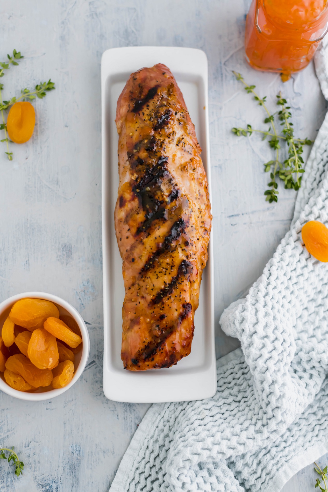 Apricot Glazed Pork Tenderloin makes for a flavorful and simple dinner any day of the week. Easy to make with just a handful of ingredients.