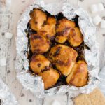 Summertime is upon us and this summer, we’re firing up the grill for a super fun dessert featuring Rhodes Bake-N-Serv rolls. This Campfire S’mores Monkey Bread is super simple to make on the grill or in the oven for a fun spin on a summertime classic.