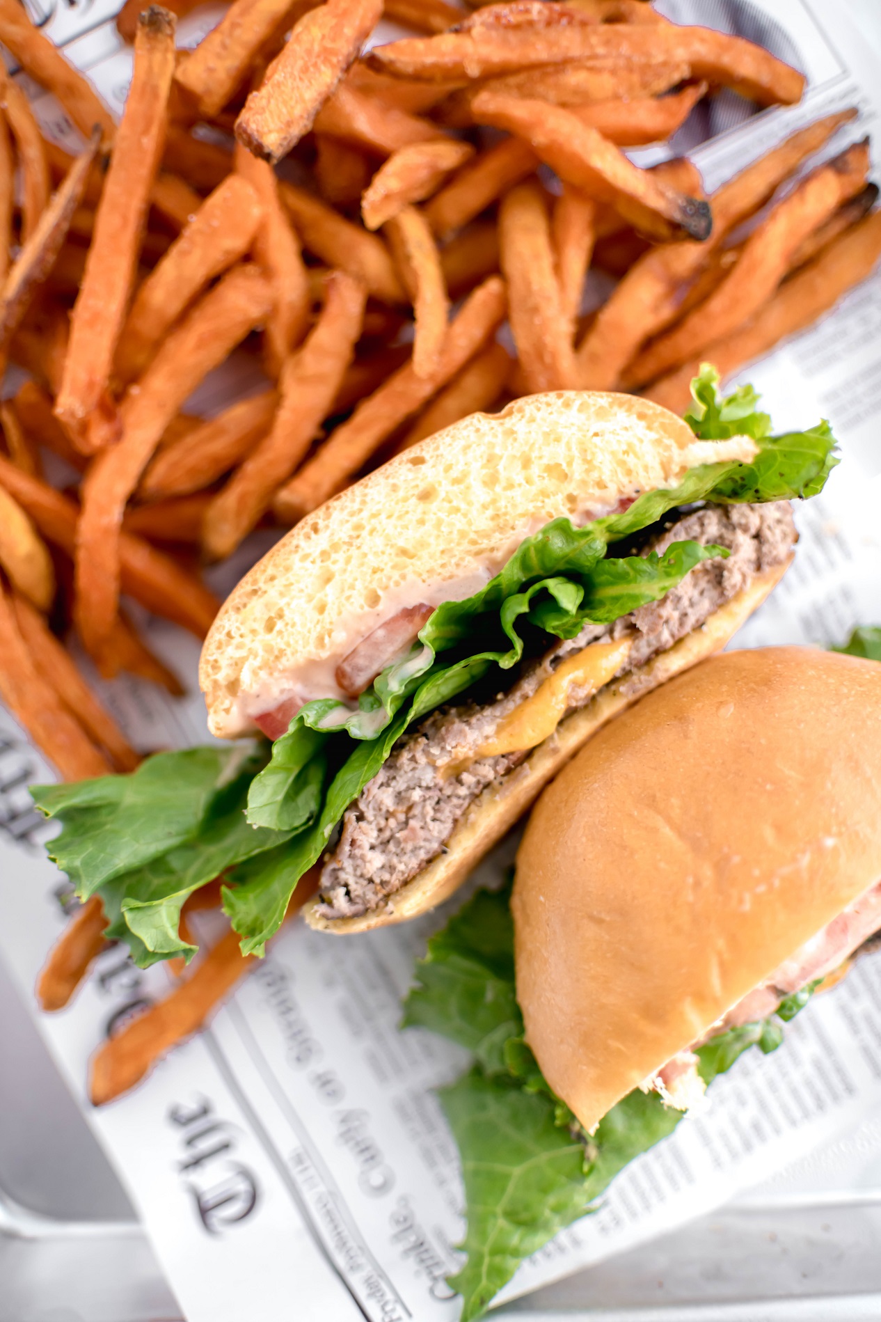 Fire up the grill and throw on these Cheddar Stuffed Turkey Burgers. Ooey gooey in the middle, super tender and perfect for all your summer cookouts.