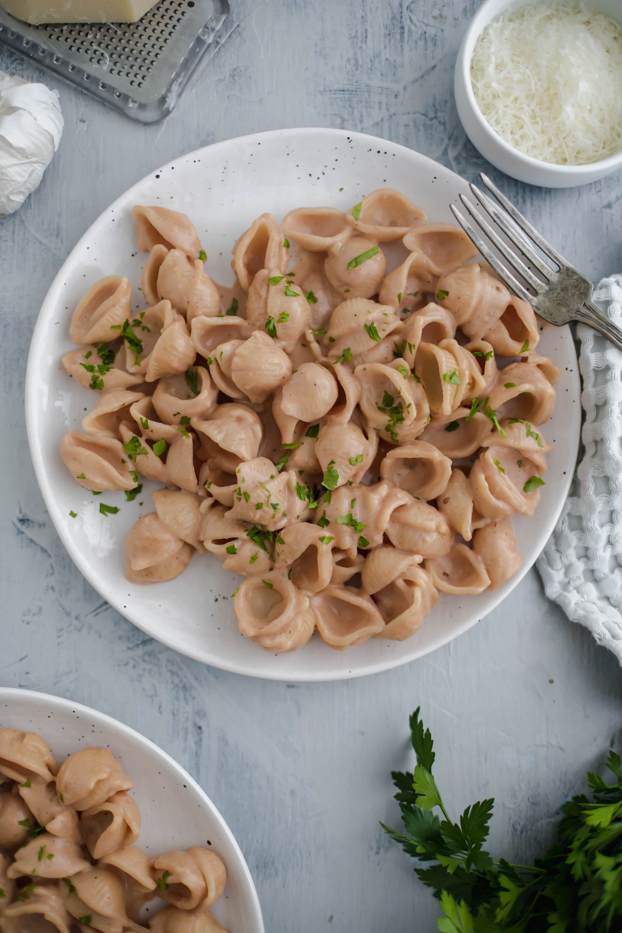 This super simple Pink Pasta Sauce is a delicious combination of spaghetti sauce and alfredo sauce that will leave you wanting seconds. Simple to make in less than 30 minutes.