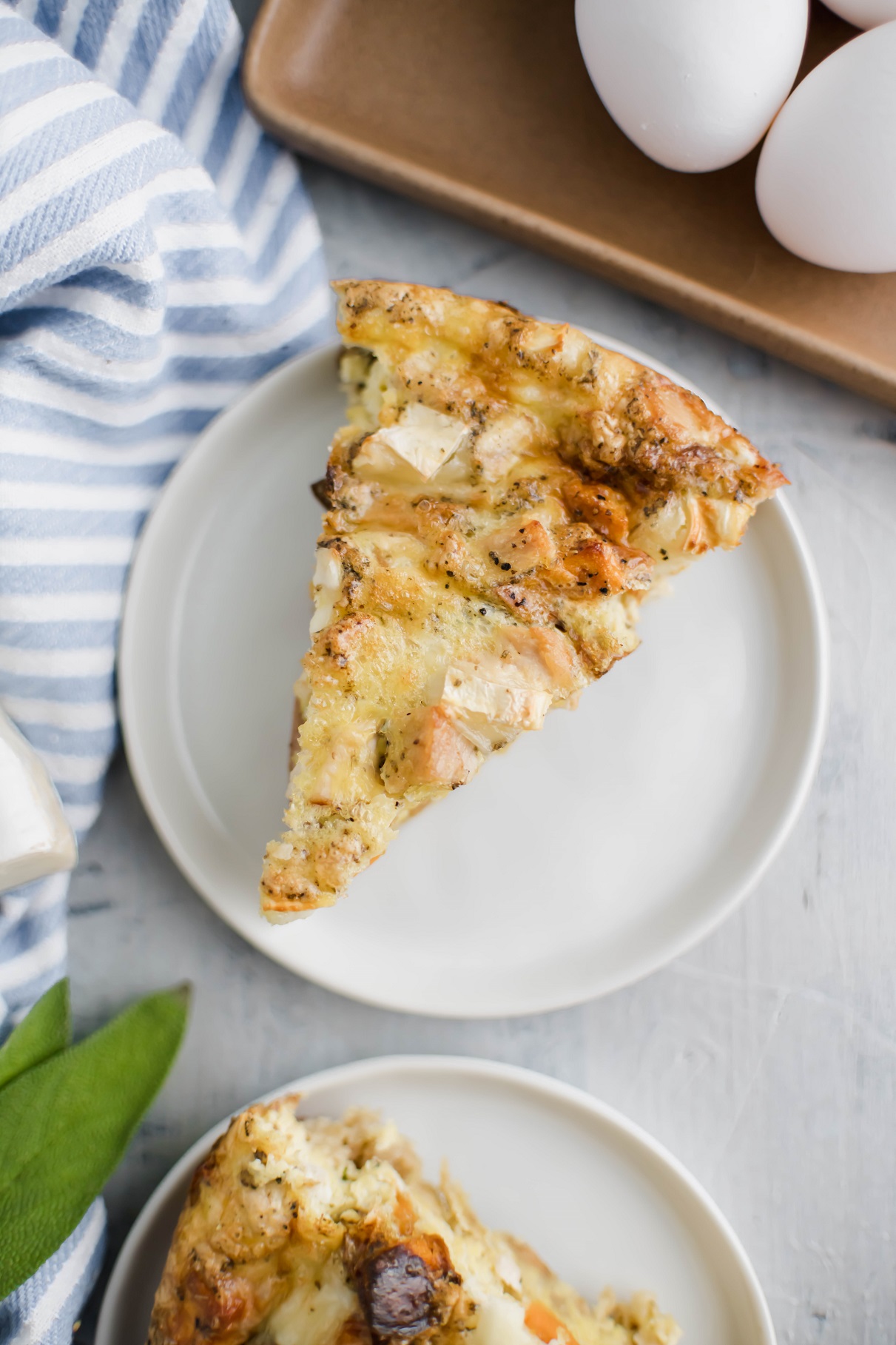 Put those delicious Thanksgiving leftovers to use and make this Thanksgiving Turkey Frittata for brunch. With a stuffing crust, it's packed with juicy turkey, tender sweet potatoes and chunks of brie cheese.