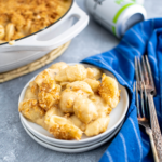 Small white plate of beer mac and cheese.