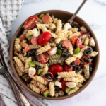 Bowl filled with pizza pasta salad.